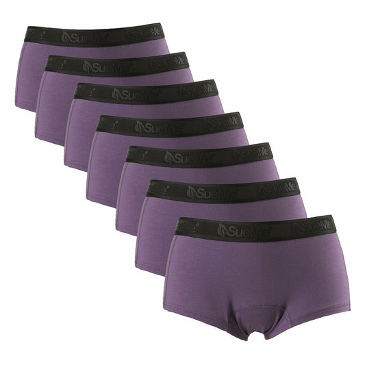 A set of seven purple women's sustainable beech shorties underwear with black elastic logo waistbands, displayed in a row.